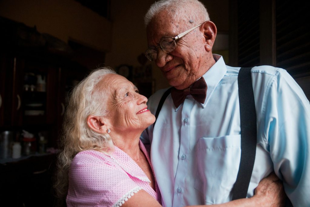 A man and a woman standing next to each other